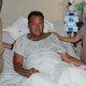 Ugriznil ga je krokodil, rešila pa ga je žena, ki je žival udarjala po glavi