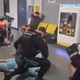 Nov posnetek policijskega nasilja: brcnil ga je v glavo in ga pohodil