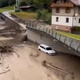 Močno neurje v Avstriji: narasla voda žensko potegnila pod avtobus
