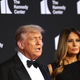 Žvižgi občinstva presenetili Melanio in Donalda Trumpa