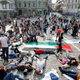 Sredi Ljubljane simbolno 'obležali za Palestino': zahtevajo takojšnje ukrepe