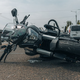 Voznika avtomobilov trčila v motorista in kolesarja: dva huje poškodovana