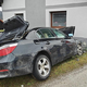 Zaspal za volanom BMW-ja in trčil v hišo