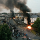(VIDEO) Izgrednik z molotovko ponesreči zakuril lastno zadnjico