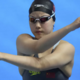 Yu Zidi razdelila plavalno in športno javnost