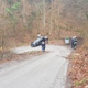 FOTO: S poledenele ceste zletela dva - prvi na streho, drugi 'le' po bregu; eden pa spet obstal na progi