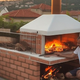 Zidani vrtni kamin - se ga še splača sezidati?