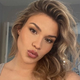 Dončićeva zaročenka se je oglasila po vrnitvi: tri črke, eno močno sporočilo (foto)
