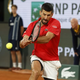 Nole, kaj si ti nor?! 38 let, 41 udarcev in ena dih jemajoča točka (video)