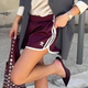 7 načinov, kako stilirati najljubši modni trend Gen Z: športne kratke hlače