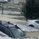"Dobeseden potop v Novem mestu": številni avtomobili pod vodo, klestila tudi toča (FOTO in VIDEO)