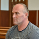 Mitja ženo zadavil in zabodel; pravnomočna sodba 22 let in pol zapora