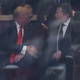 Trump in Musk sta si segla v roke na pogrebni slovesnosti