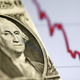 Močnejši dolar ustavil Wall Street, konec veselice tudi na kriptotržišču