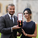 David Beckham na gradu Windsor prejel viteški naziv