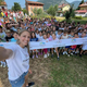 Številni športniki na olimpijski dan v družbi mladih