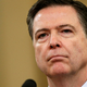 Nekdanji direktor FBI-ja James Comey se je predal policiji in soočil z obtožnico ogrožanja Trumpa
