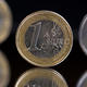 Alarm v Bruslju: je evro v nevarnosti?