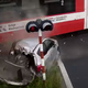 Osebni avtomobil vlak zmečkal, kombi prepolovil #video