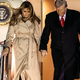 Melania Trump na Otok priletela v britanskem plašču #foto