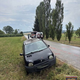 (FOTO) Trčila kombinirano in osebno vozilo, ena oseba poškodovana