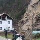 (FOTO) Na območju Cerknega plaz še vedno ogroža hišo, opravili bodo le najbolj nujna dela