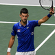 Novak Đoković z ženo fotografiran sredi Beograda, tako se obnašata, ko mislita, da ju nihče ne gleda