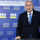 Toliko podpornikov vlade Roberta Goloba je v nedeljo glasovalo za Janšo